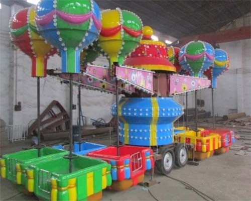 Quality 32 Seats Trailer Mounted Rides With Colorful Balloons And Beautiful Cabins for sale