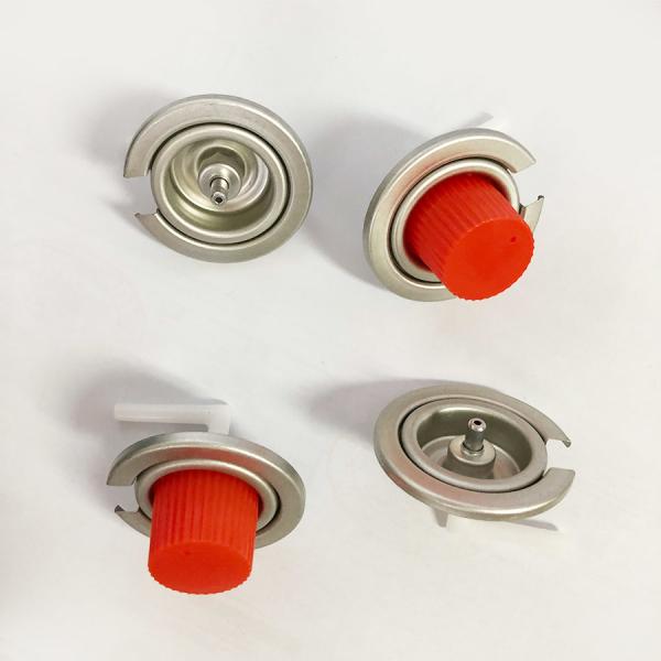 Close-up view of butane gas stove valve showing construction details