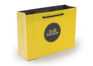 China Yellow Recycled Paper Bags Printed With Logo Rope Handle OEM Service on sale