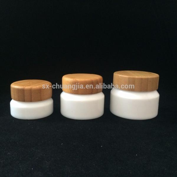 Buy New products 15ml 30ml 50ml 100ml opal white cream glass jar with bamboo screw cap at wholesale prices