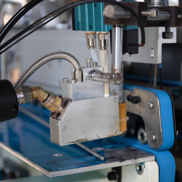 Innovative Automatic Carton Box Folding Gluing Stitching Machine for Aluminum Foil Box