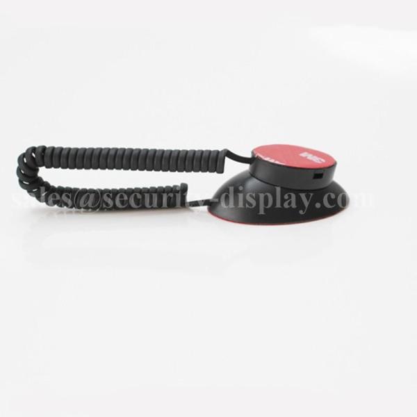 Buy Universal Coiled Security Tether with Magnets and Double-Sided Tape at wholesale prices