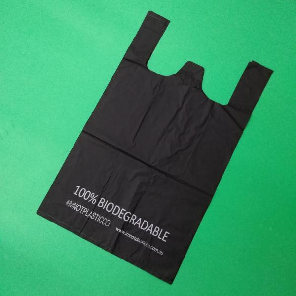 Buy 100% biodegradable and compostable T-shirt bag, black color, size 0.025mm x (30+15)x50cm, withstand 5kg at wholesale prices