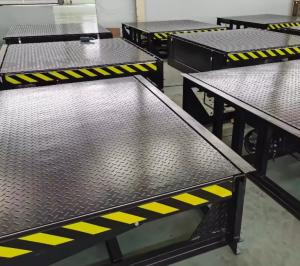 Quality Customizable Powder Coated/Galvanized Loading Dock Leveler with Safety Chains and Handheld Remote Controls for sale