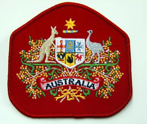 Buy Twill Fabric Custom Logo Merrow Edges Backing Glue Embroidered Patches at wholesale prices