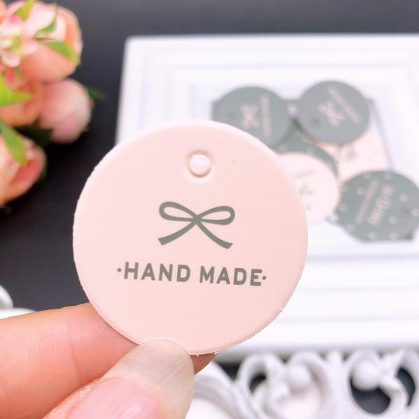 Custom hang tags for sale cloth paper hang tag China on Bags garment logo hang tag