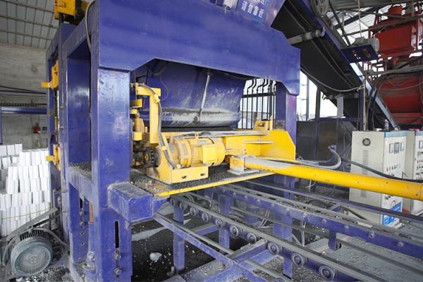 Buy PLC Control QT12-15 2000Pcs/H Concrete Paver Block Machine Concrete Block Making Machine at wholesale prices