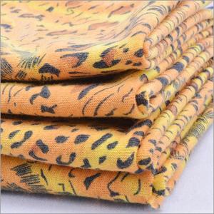 Rusha Textile   Tiger Skin Printed Spandex Poly Spun Single Jersey Open Weave Knit Fabric