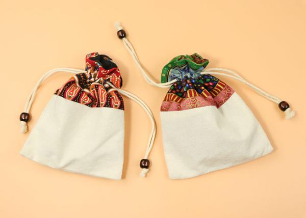 Buy Wooden Bead Drawstring Splicing Recyclable Canvas Drawstring Bag at wholesale prices