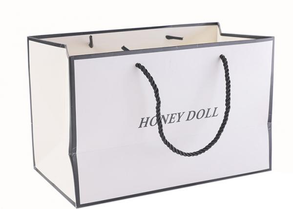 Buy OEM / ODM White Merchandise Bags , Biodegradable Paper Carrier Bags With Logo at wholesale prices