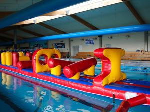 China 54 FT Long Giant Water Inflatable Obstacle Course With Slide Durable 0.9mm PVC on sale