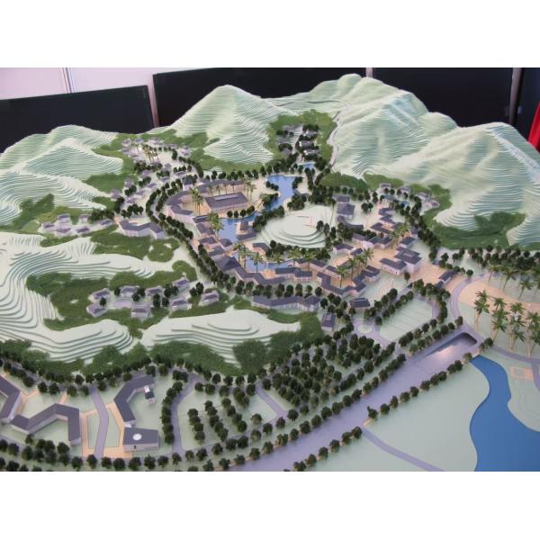 Architectural Model of Urban Master Plan with Green Landscape, Roads, and Mixed-Use Developments