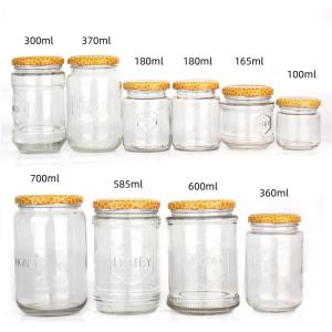 Quality 100ml 300ml 700ml Clear Honey Jam Food Glass Jar Bottles With Metal Lid for sale