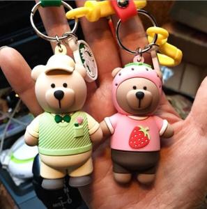 China Custom High Quality 3d Brown Bear Doll Keychain Key Holder With Silicone Wristband, Different Design Available on sale