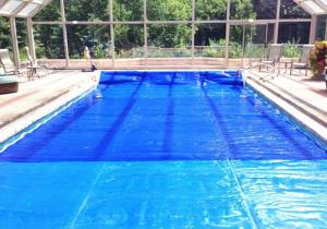 Quality 500um Blue Swimming Pool Solar Cover Heating Blanket For Above Ground Private Solar Pool Cover for sale