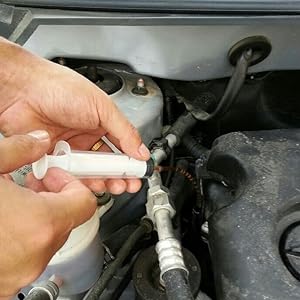 Oil extracting syring